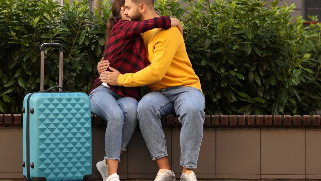 man and woman in a warm hug