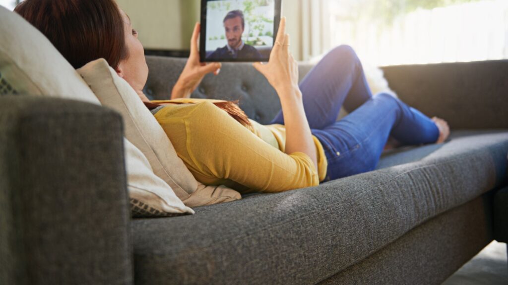 Lady talking with her boyfriend on google meet