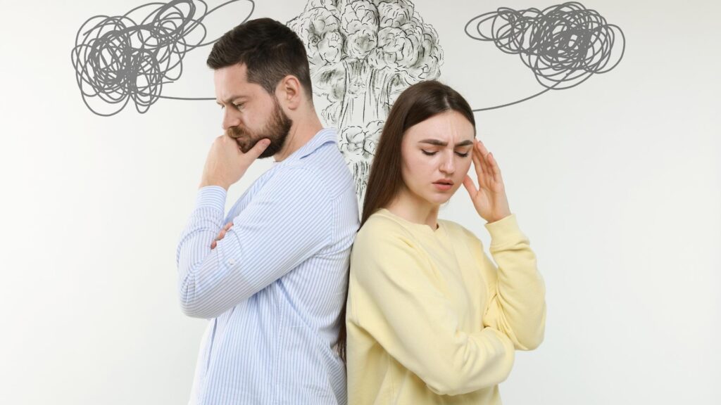 man and woman turning their back against each other 