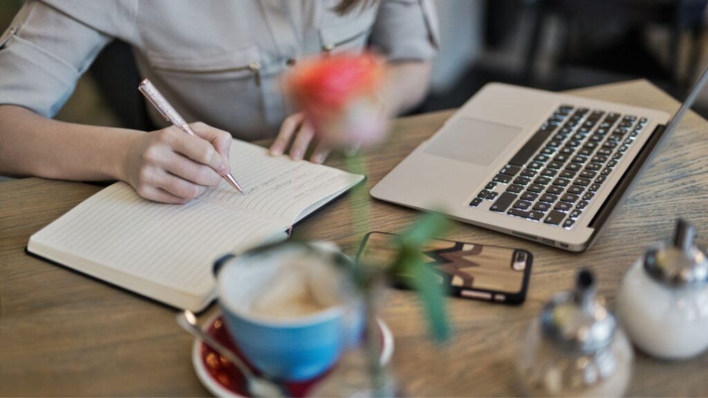 man writing love letter to his woman
