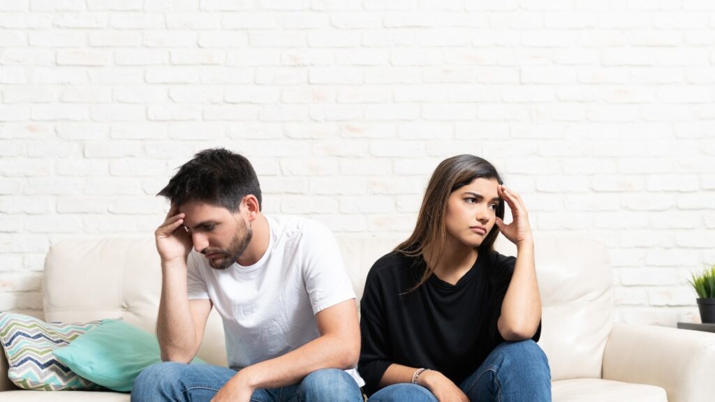 couple worried about the distance between them