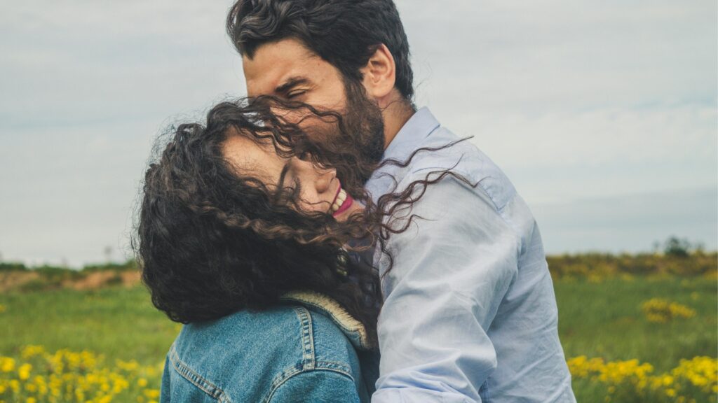 couple hugging deeply to release some stress from the day