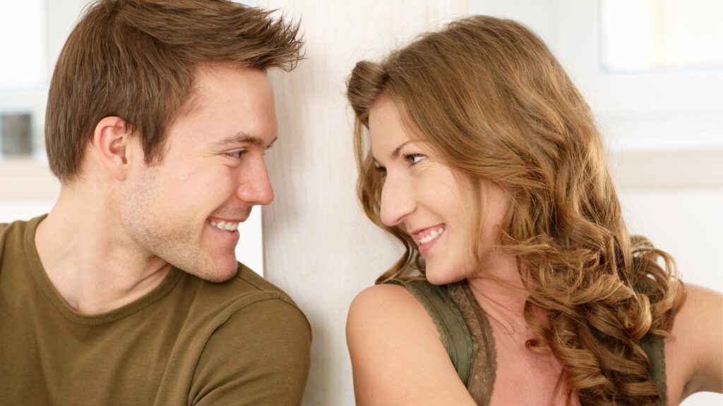 Couple just smiling at each other without talking 