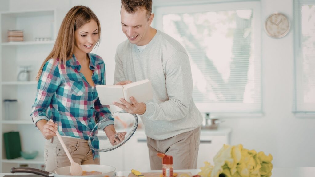 couple cooking dinner together