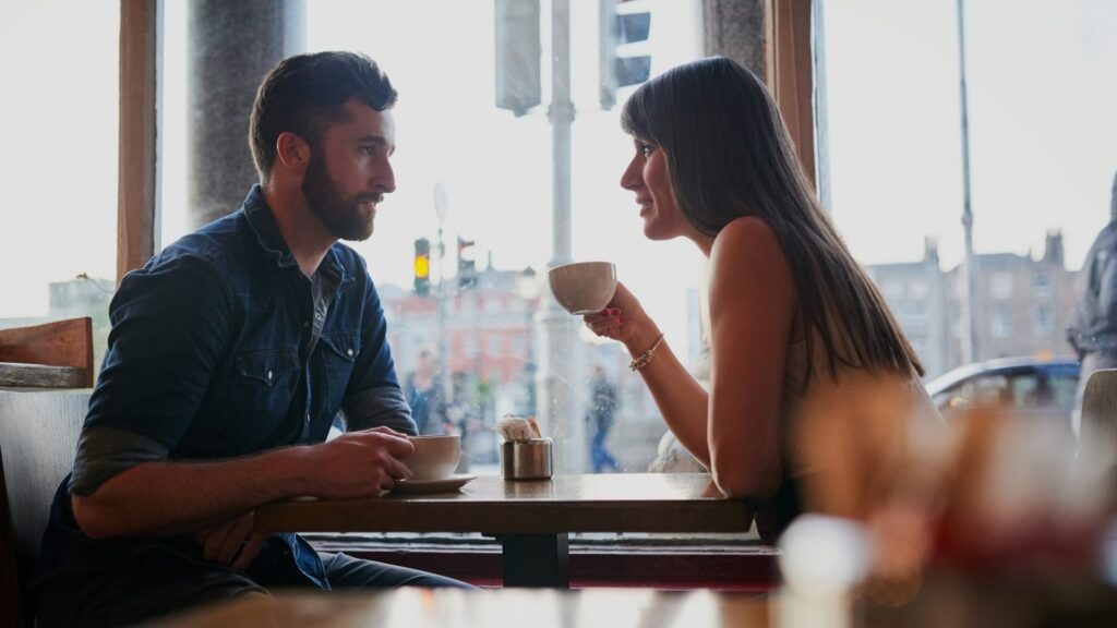 couple having coffee during a date 