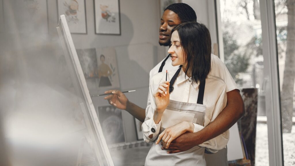 lady out with her long disance boyfriend on a paint and sip date