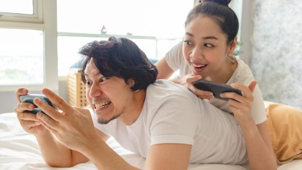 couple playing an online card game