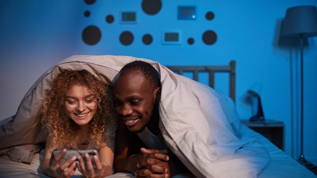 man and woman setting the atmosphere right for intimacy