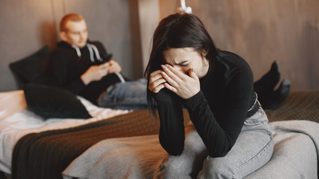 woman sad because man is indifferent