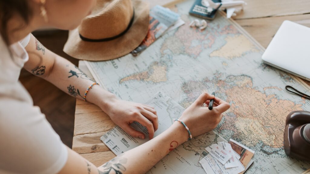 lady drawing a fun map just to gift her long-distance partner
