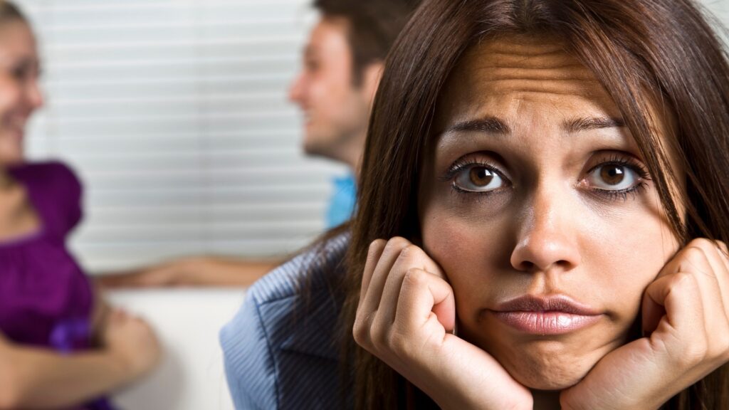 lady making up infidelity stories in her head against her long-distance partner
