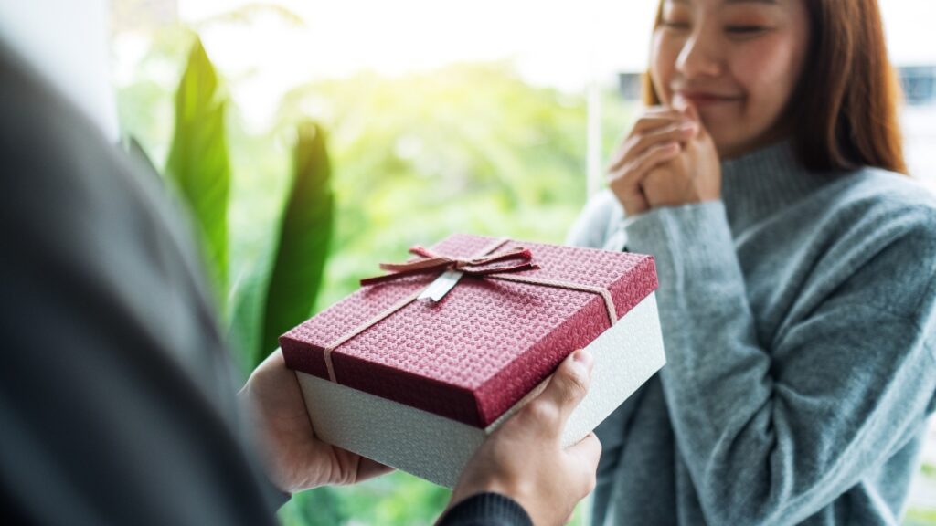 lady receiving a spa package from long distance partner