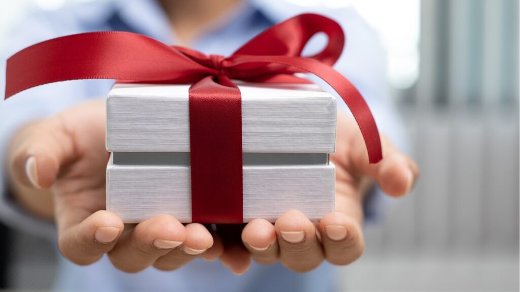 lady suprising her long distance partner with a subscription box