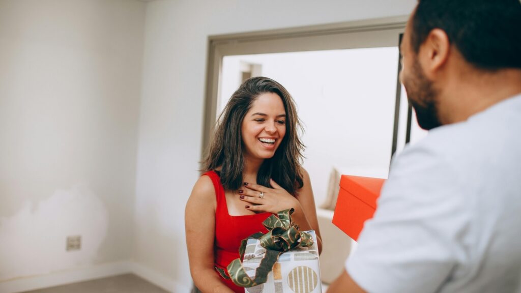 lady happy as she receives a customised music box