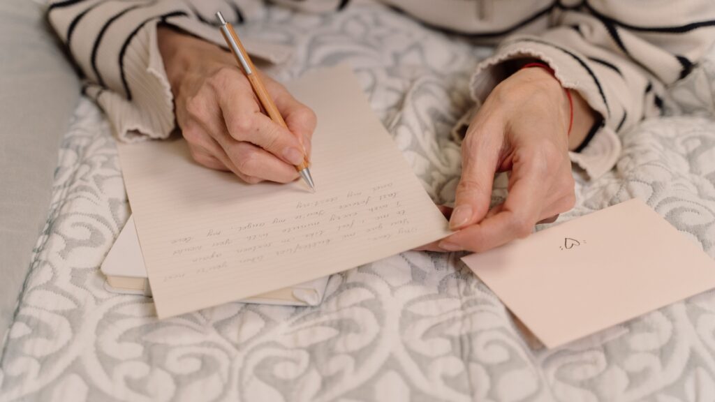 lady gifting her long-distance partner a handwritten love letter