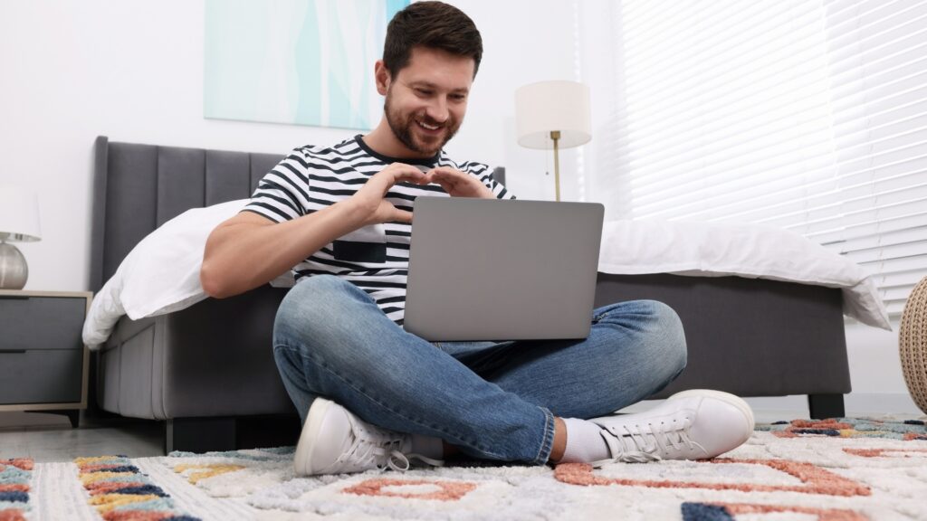 man keeping to his routine of everyday evening video calls with long distance partner