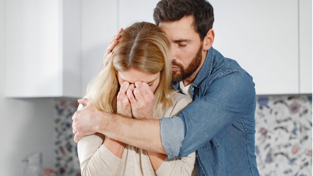 man trying to reassure his woman