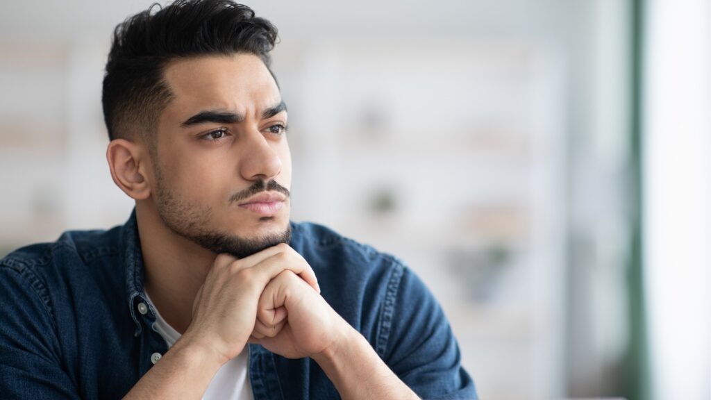 man in doubt of his girl friend's loyalty