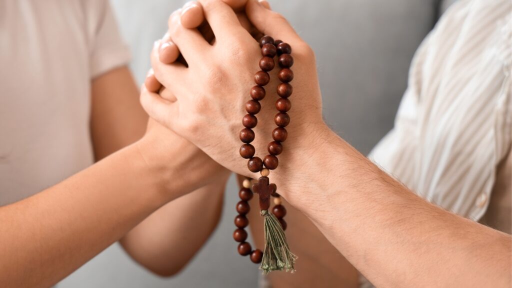 hands held together in prayers
