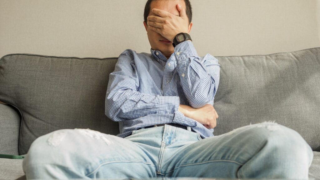 man feeling very lonely even while in a relationship