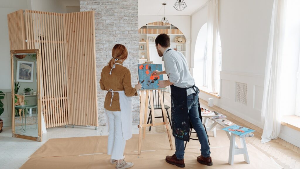 couple painting a memory from their childhood