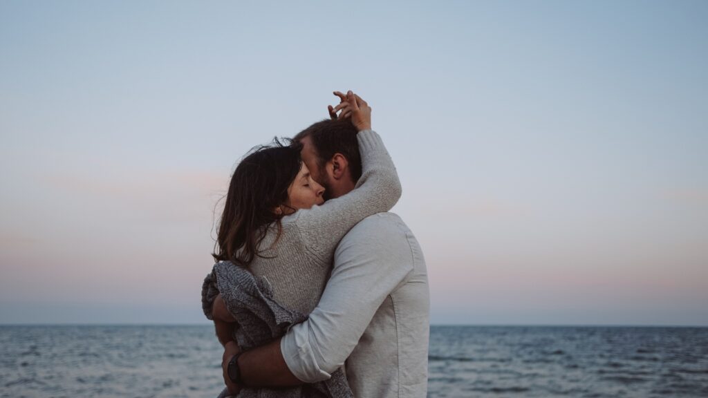 couple holding unto each other and not letting outside inerference come between them
