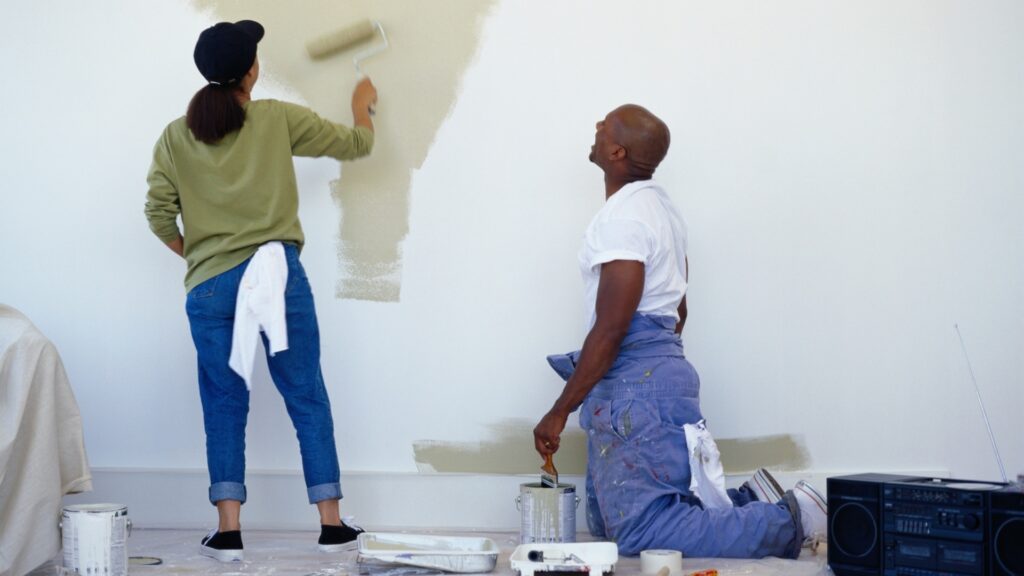 couple talking while painting 