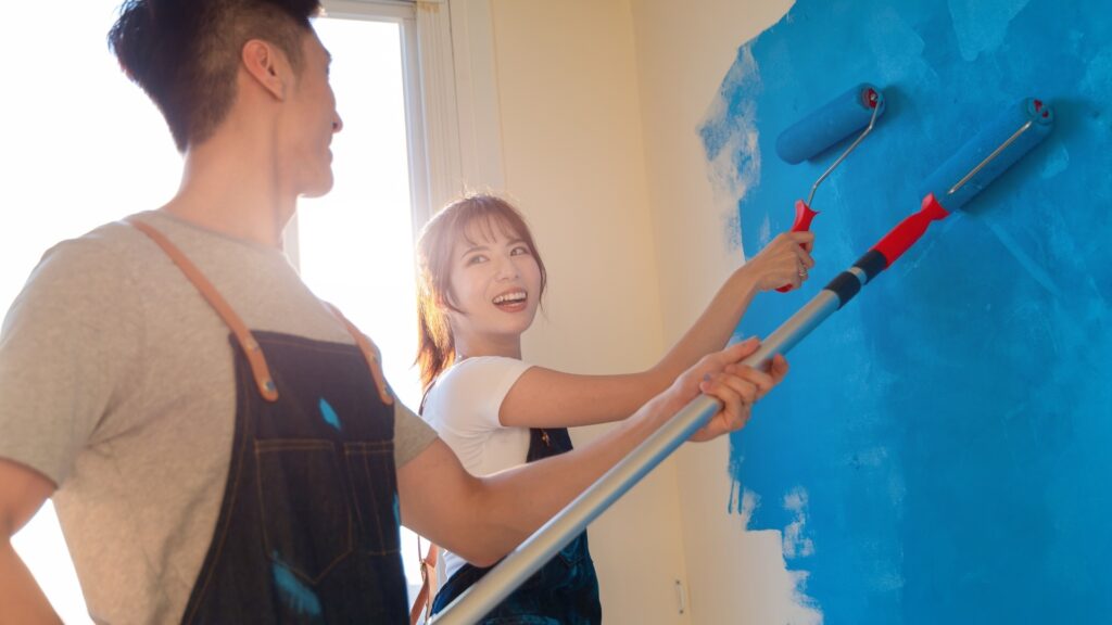 long distance couple painting their future home