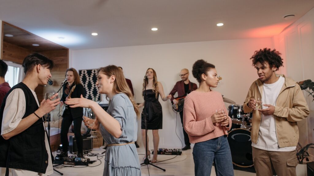 couples singing along in a karoke night