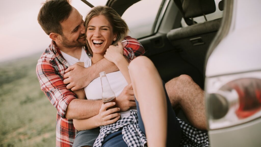 couple having fun during a virtual road trip