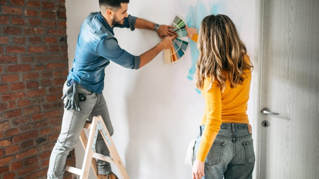couple painting each other's favorite 
