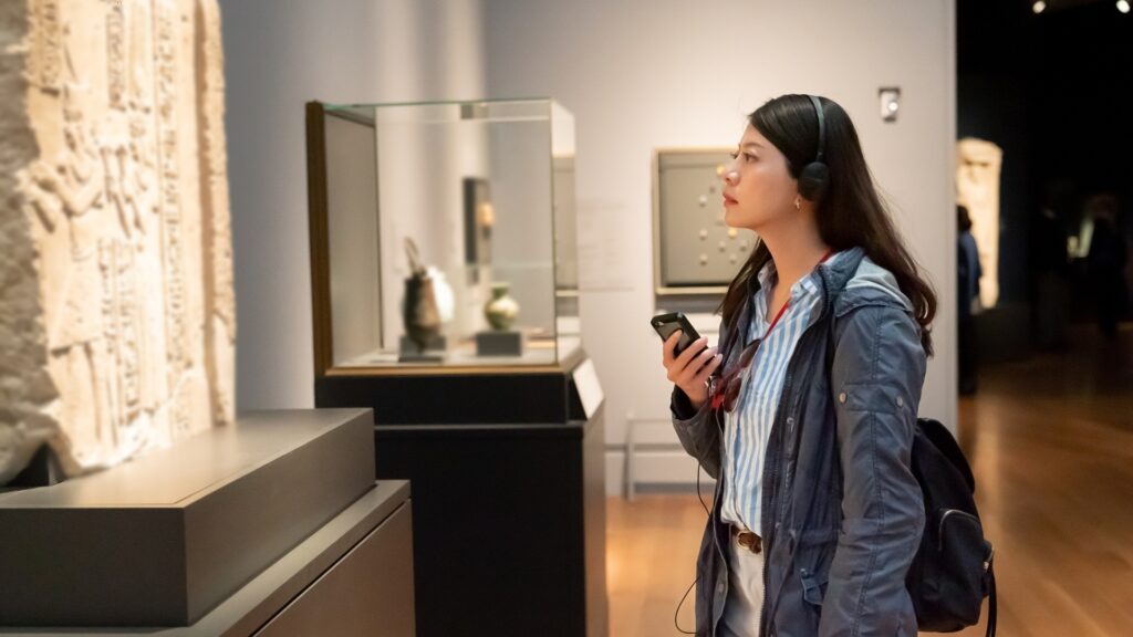 lady gathering informations a museum to discuss with her long distance boyfriend