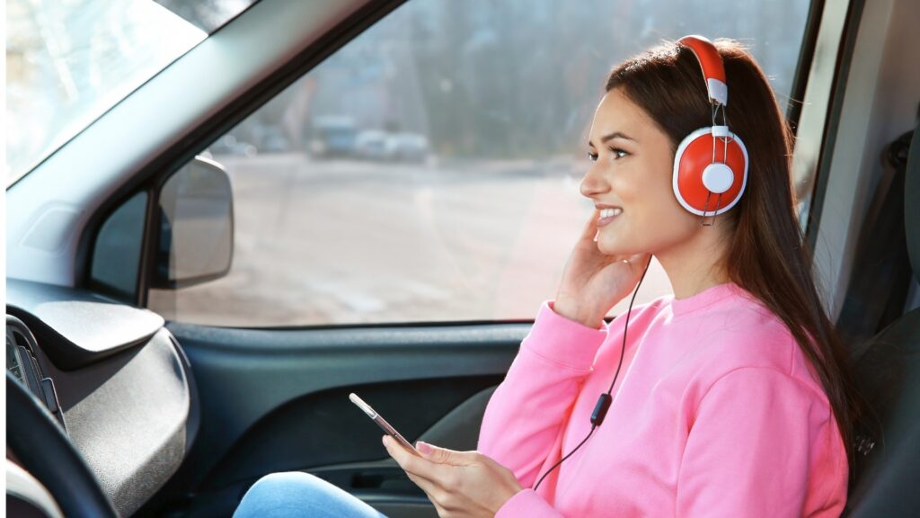 lady singing with her partner during a virtual road trip