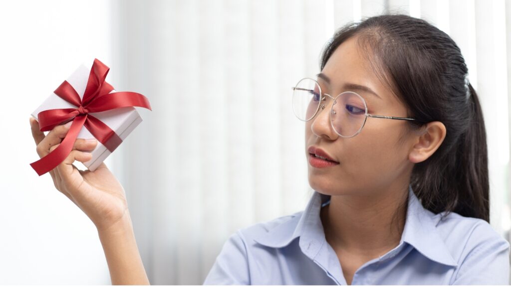 lady examining her gift