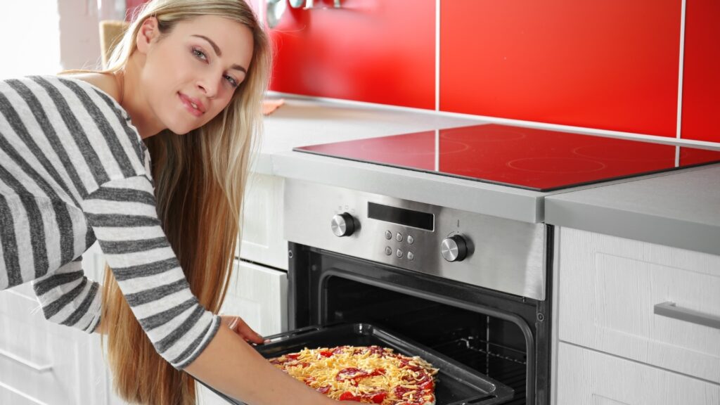 lady making pizza