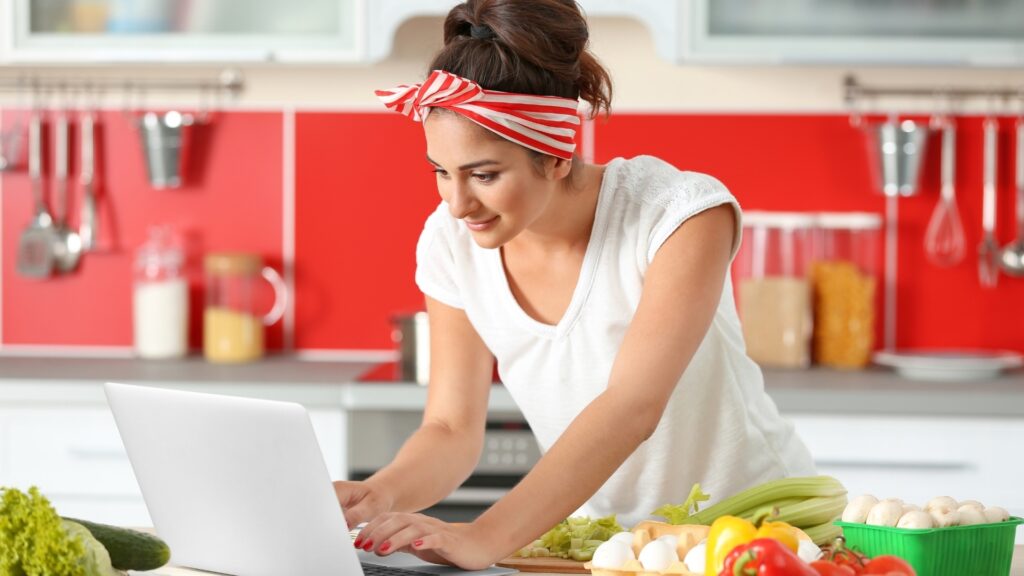 woman cooking over video