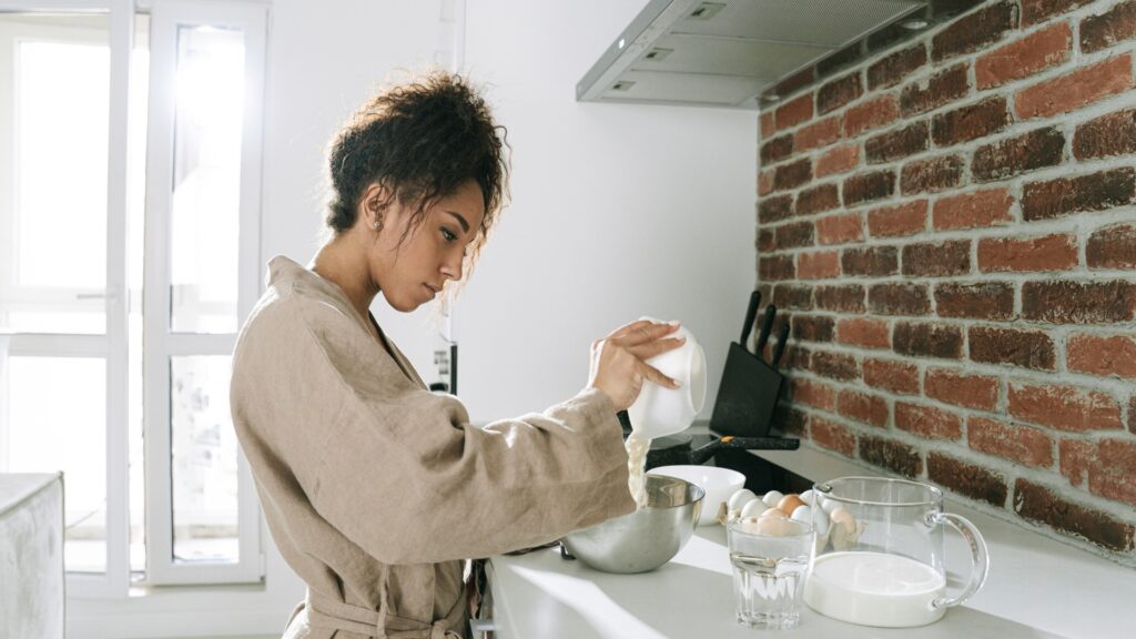 lady prepping ingredients for pizza