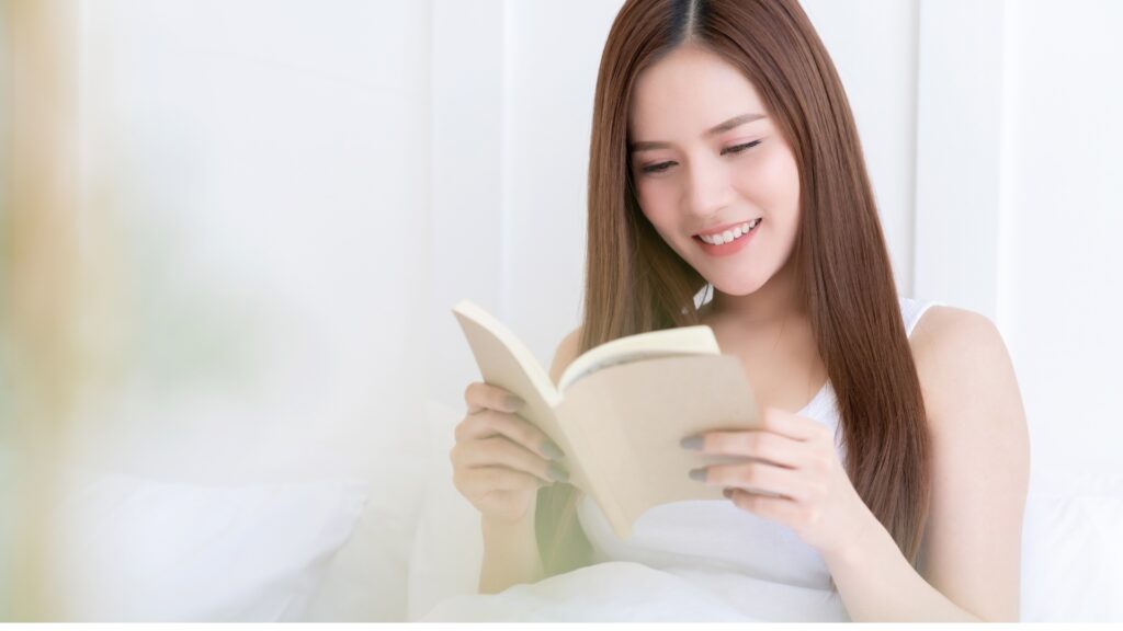 lady reading a great book in order to develop her mind