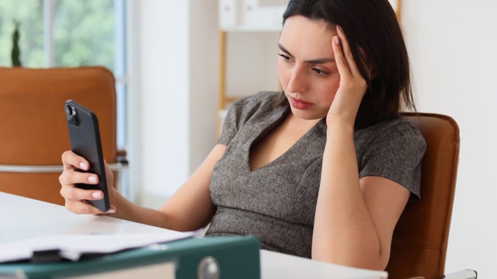 lady in her office worried about some assumptions she is having about her long-distance partner