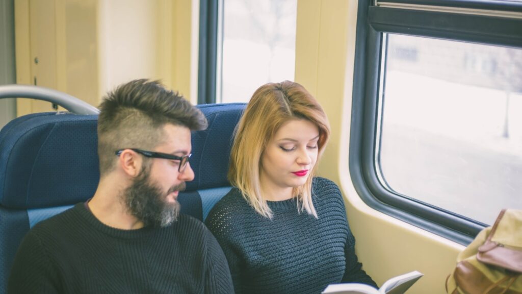 couple reading a during a trip