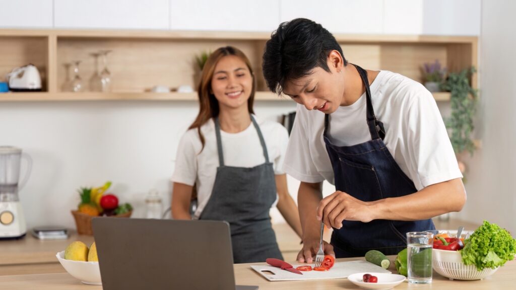 couple making their own home made burger
