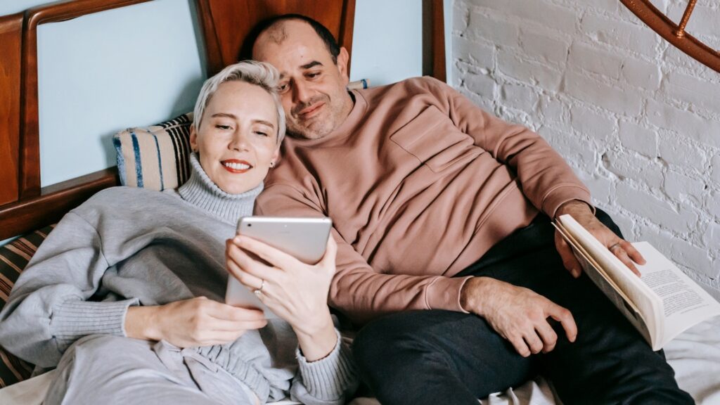 couple selecting the movie to watch together
