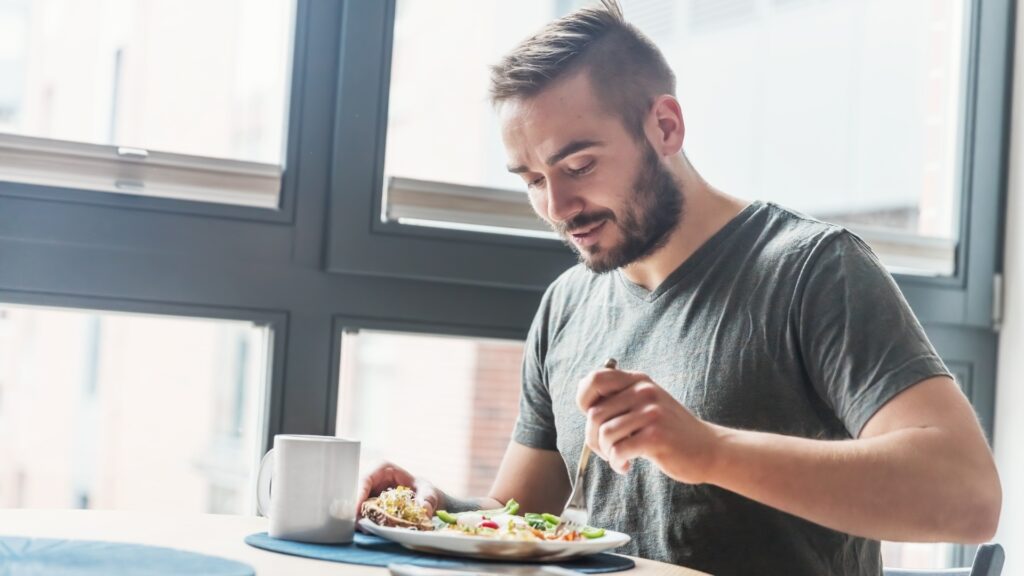 man eating during a date