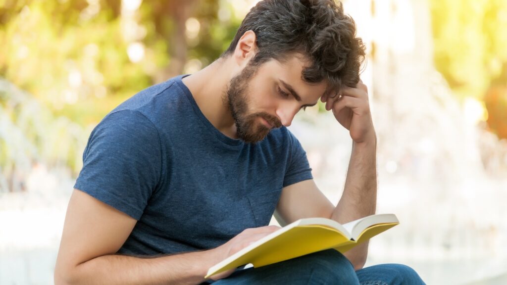 man reading his favorite book 