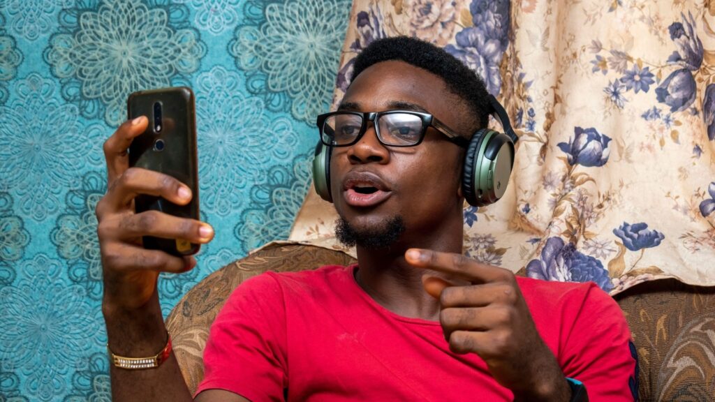man asking his long-distance partner some questions