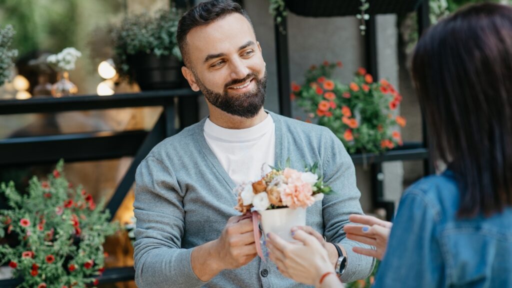 man gifting his long distance partner during a fun game
