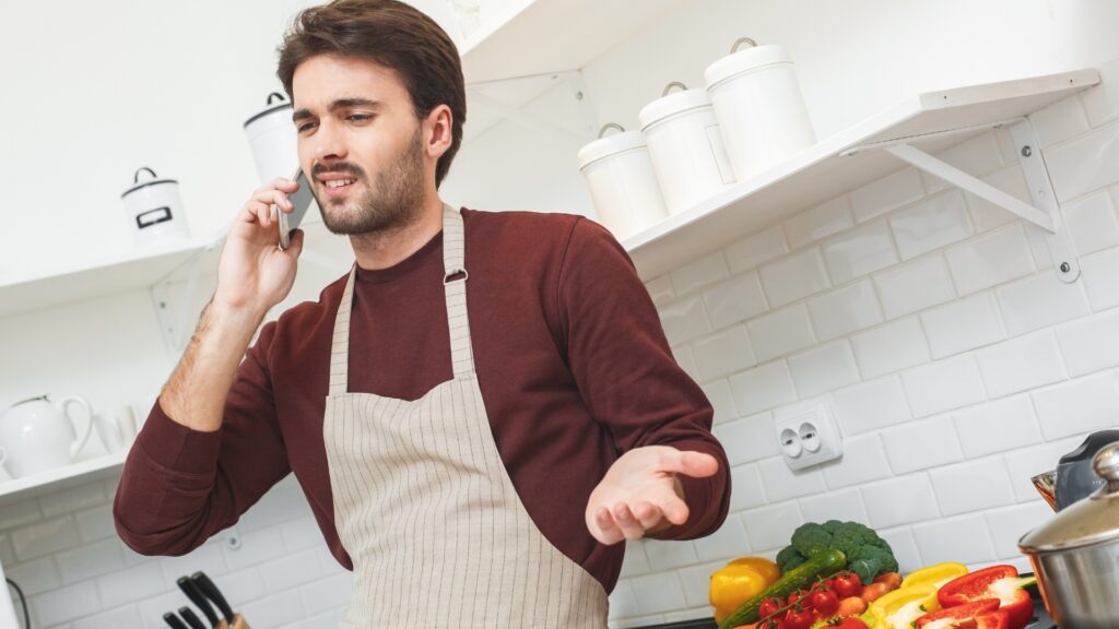 man engaging in cooking which is his hobby
