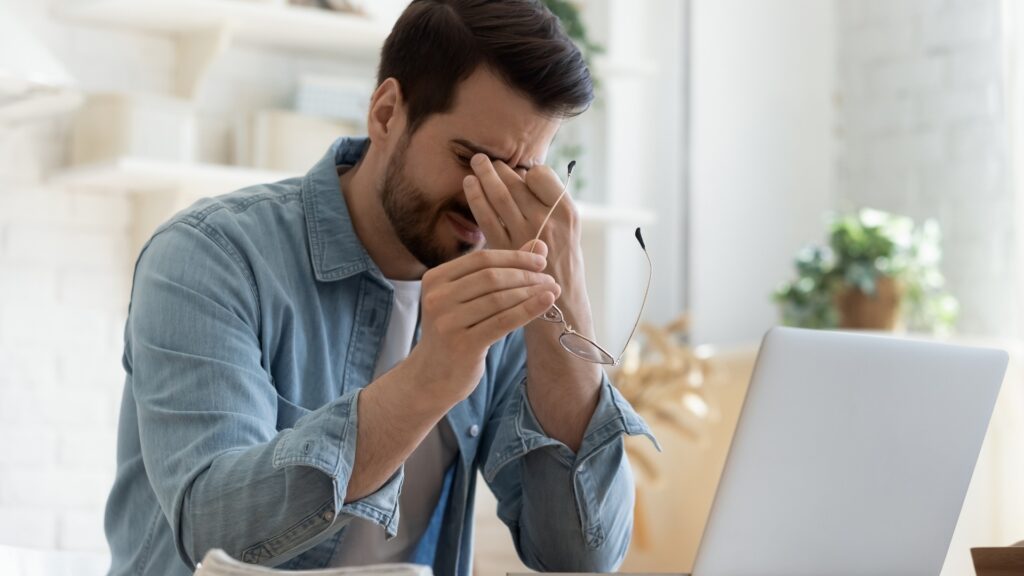 man trying not to react to his need for validation