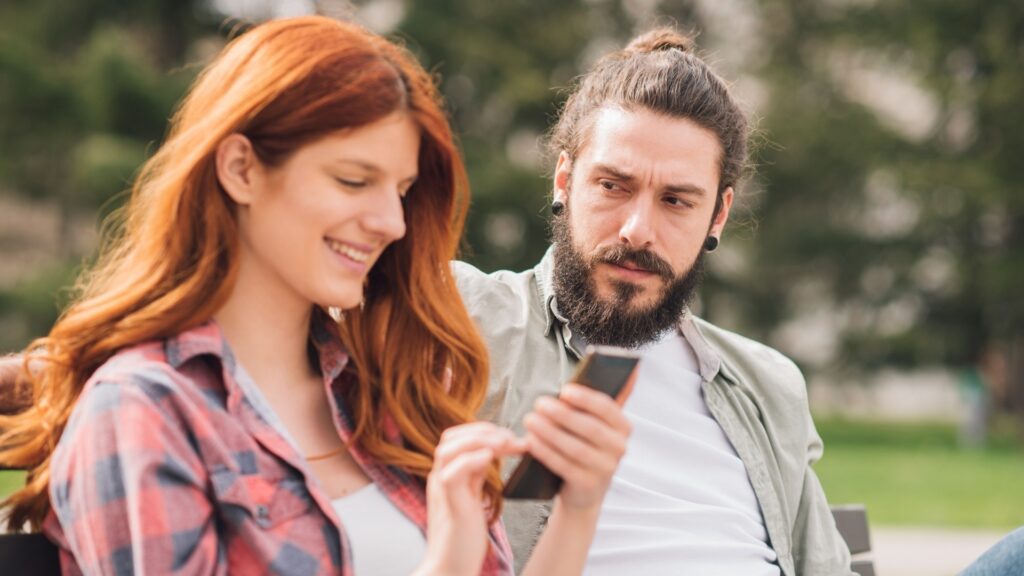man trying to decode the mood of his long-distance partner