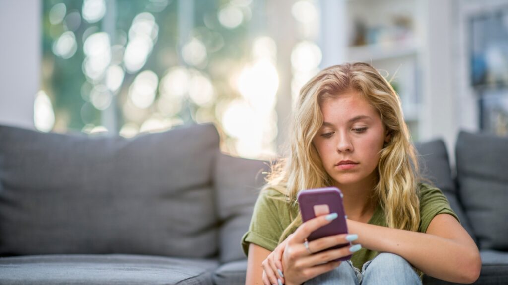 lady consuming contents from social media